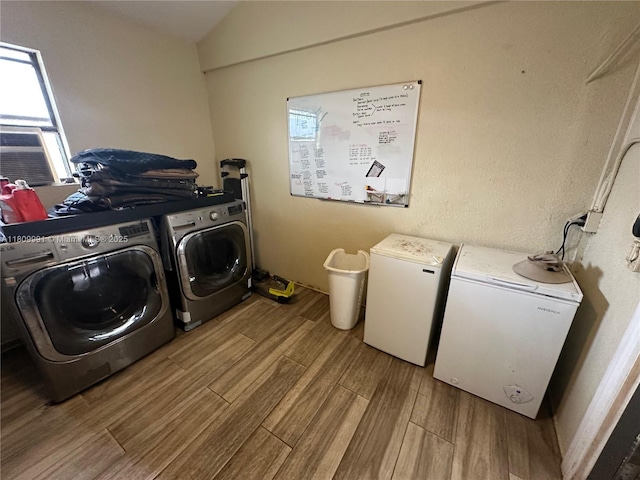 1230 F Rd, Loxahatchee, FL 33470 - laundry room with washer and dryer and wood finished floors