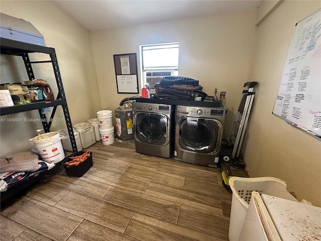 1230 F Rd, Loxahatchee, FL 33470 - washroom featuring independent washer and dryer and wood finish floors