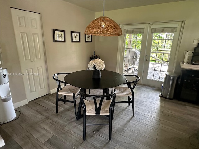 1230 F Rd, Loxahatchee, FL 33470 - dining area with wood finished floors, french doors, and baseboards