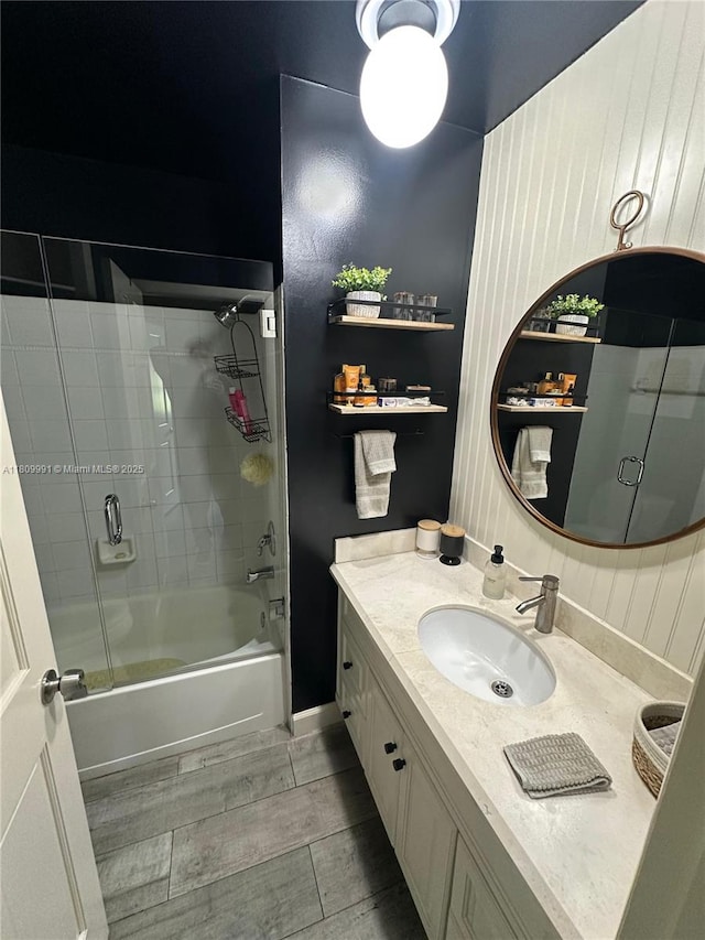 1230 F Rd, Loxahatchee, FL 33470 - bathroom featuring vanity, enclosed tub / shower combo, and wood finished floors