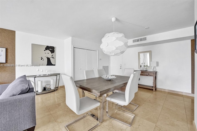 9195 Collins Ave Unit 304, Surfside, FL 33154 - dining room featuring light tile patterned flooring