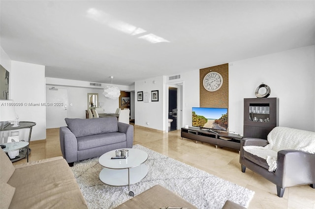 9195 Collins Ave Unit 304, Surfside, FL 33154 - living area featuring tile patterned flooring