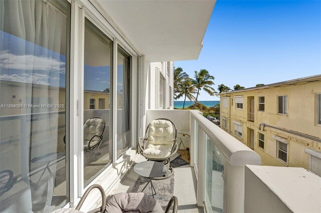 9195 Collins Ave Unit 304, Surfside, FL 33154 - balcony with view of water and beach and central AC