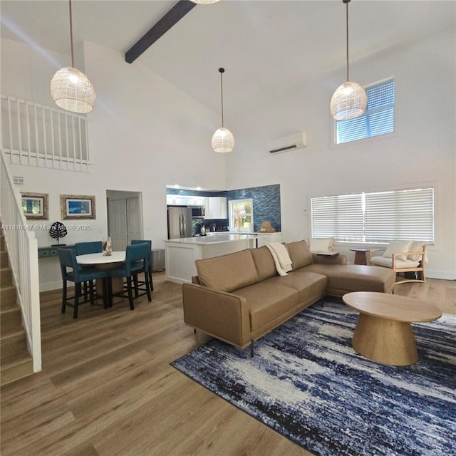 460 Barry Ave, Lower Keys, FL 33042 - living room with high vaulted ceiling, stairs, light wood-style floors, beamed ceiling, and a wall mounted air conditioner