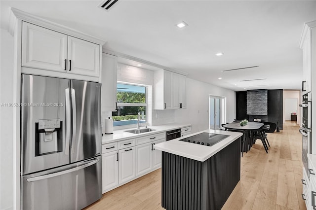 7941 SW 143rd St, Palmetto Bay, FL 33158 - dining space with light wood-type flooring, french doors, and recessed lighting