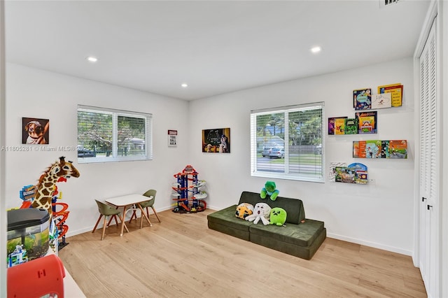 7941 SW 143rd St, Palmetto Bay, FL 33158 - recreation room with wood finished floors, recessed lighting, and baseboards
