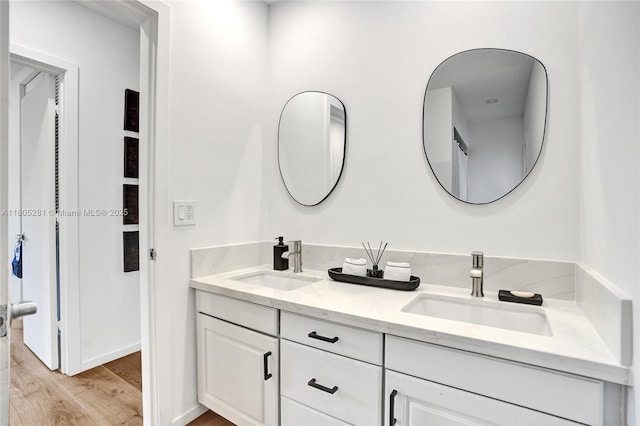 7941 SW 143rd St, Palmetto Bay, FL 33158 - full bathroom with double vanity and wood finished floors