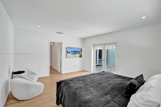 7941 SW 143rd St, Palmetto Bay, FL 33158 - bedroom featuring french doors, light wood-style floors, baseboards, and recessed lighting