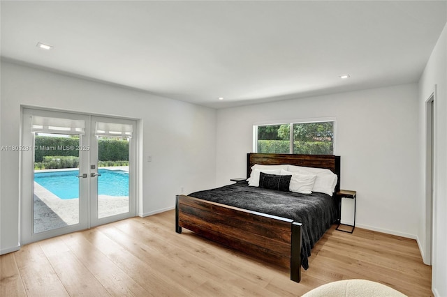 7941 SW 143rd St, Palmetto Bay, FL 33158 - bedroom with french doors, multiple windows, light wood finished floors, access to exterior, and recessed lighting