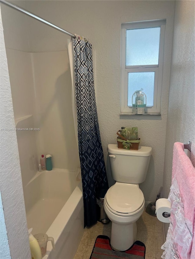 20390 SW 119th Ave, Miami, FL 33177 - bathroom with tile patterned floors, toilet, shower / bath combo, and a textured wall