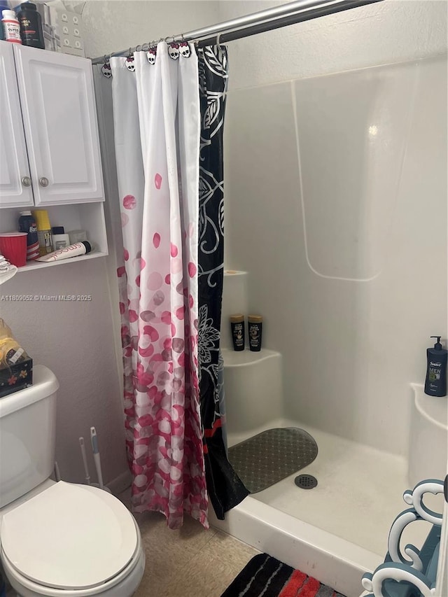 20390 SW 119th Ave, Miami, FL 33177 - full bathroom featuring a shower stall and toilet