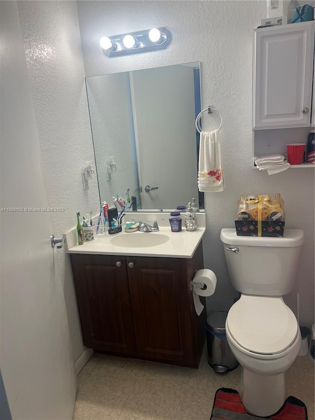 20390 SW 119th Ave, Miami, FL 33177 - half bath with vanity, toilet, and a textured wall