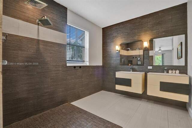 1070 Briar Ridge Rd, Weston, FL 33327 - full bath featuring tile walls, walk in shower, vanity, plenty of natural light, and tile patterned flooring
