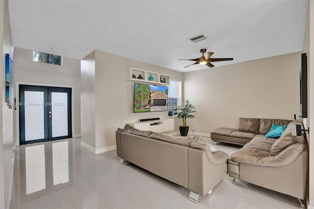 1070 Briar Ridge Rd, Weston, FL 33327 - living area with baseboards, light tile patterned floors, french doors, and ceiling fan