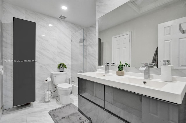 1070 Briar Ridge Rd, Weston, FL 33327 - bathroom with double vanity, toilet, marble finish flooring, and an enclosed shower