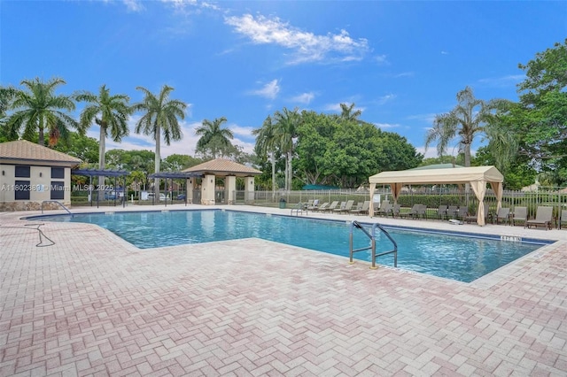 1070 Briar Ridge Rd, Weston, FL 33327 - community pool featuring a gazebo and a patio area