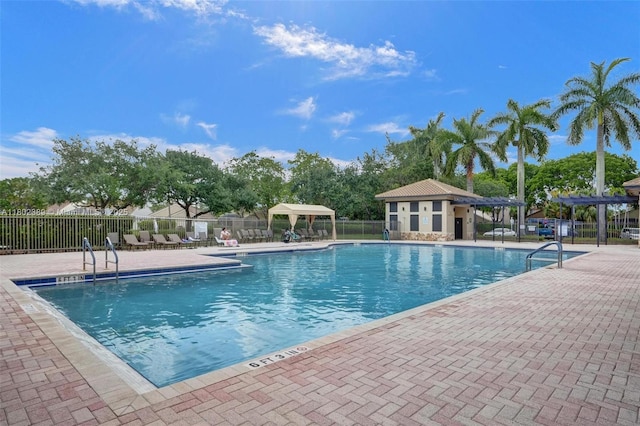 1070 Briar Ridge Rd, Weston, FL 33327 - community pool with a pergola and a patio