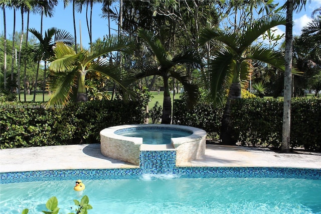 9941 SW 97th Ct, Miami, FL 33176 - view of swimming pool with a pool with connected hot tub
