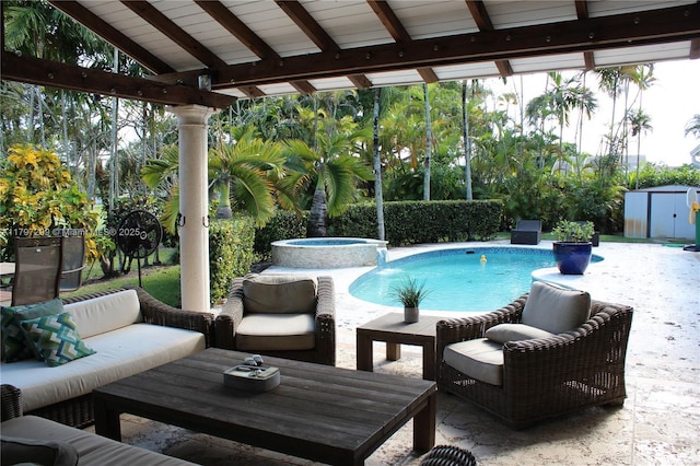 9941 SW 97th Ct, Miami, FL 33176 - view of swimming pool with a patio area, an outdoor hangout area, and a pool with connected hot tub