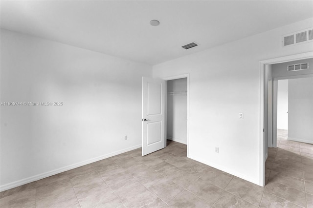 1130 SW Jericho Ave, Port St Lucie, FL 34953 - unfurnished bedroom with light tile patterned flooring and a closet