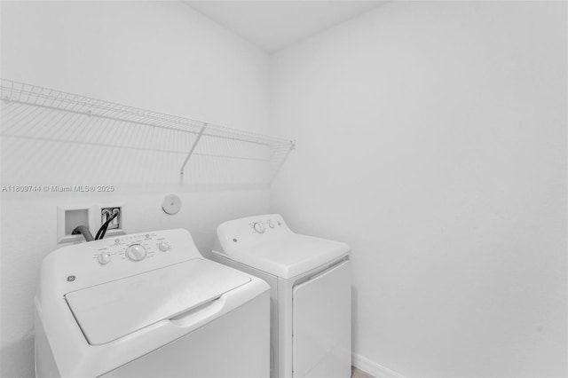 1130 SW Jericho Ave, Port St Lucie, FL 34953 - washroom with independent washer and dryer and baseboards