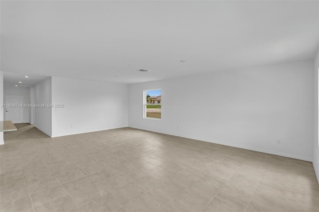 1130 SW Jericho Ave, Port St Lucie, FL 34953 - unfurnished room with recessed lighting
