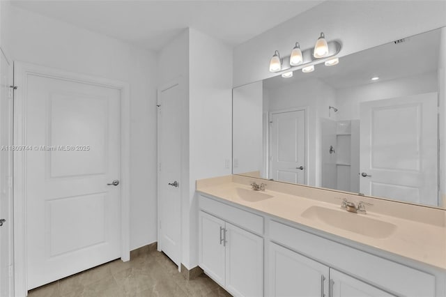 1130 SW Jericho Ave, Port St Lucie, FL 34953 - full bath featuring double vanity and a shower