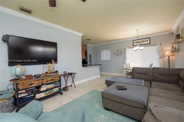 16610 SW 294th Ter, Homestead, FL 33033 - living area with light tile patterned floors, crown molding, a chandelier, and baseboards