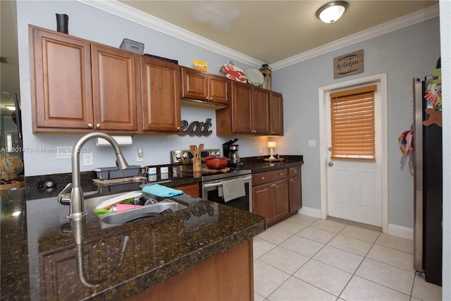 16610 SW 294th Ter, Homestead, FL 33033 - kitchen featuring appliances with stainless steel finishes, a sink, ornamental molding, light tile patterned flooring, and baseboards