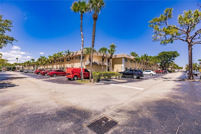5156 NE 6th Ave Unit 227, Oakland Park, FL 33334 - view of property featuring uncovered parking and a residential view