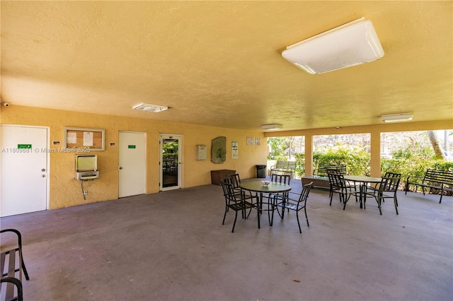 5156 NE 6th Ave Unit 227, Oakland Park, FL 33334 - dining area with concrete flooring