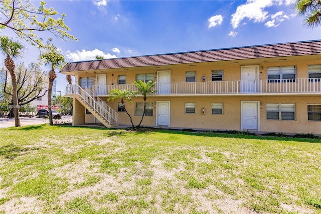 5156 NE 6th Ave Unit 227, Oakland Park, FL 33334 - view of building exterior featuring stairway