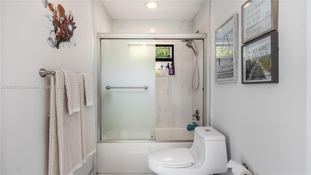 10412 NW 6th St, Coral Springs, FL 33071 - bathroom featuring toilet and combined bath / shower with glass door
