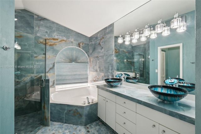 5708 NW 47th Ct, Coral Springs, FL 33067 - full bath featuring a garden tub, double vanity, vaulted ceiling, a shower stall, and tile patterned floors