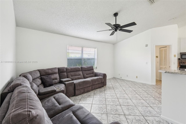 5708 NW 47th Ct, Coral Springs, FL 33067 - living room featuring ceiling fan, lofted ceiling, and a textured ceiling