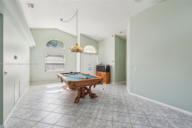 5708 NW 47th Ct, Coral Springs, FL 33067 - playroom featuring vaulted ceiling, billiards, a textured ceiling, baseboards, and light tile patterned flooring