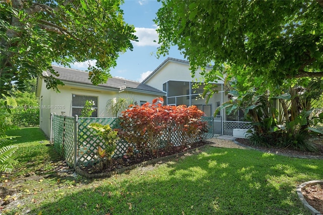5708 NW 47th Ct, Coral Springs, FL 33067 - view of yard featuring a sunroom