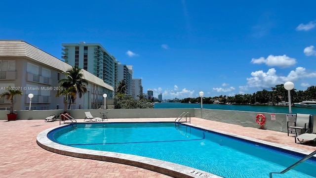 5838 Collins Ave Unit 2H, Miami Beach, FL 33140 - community pool with a patio area
