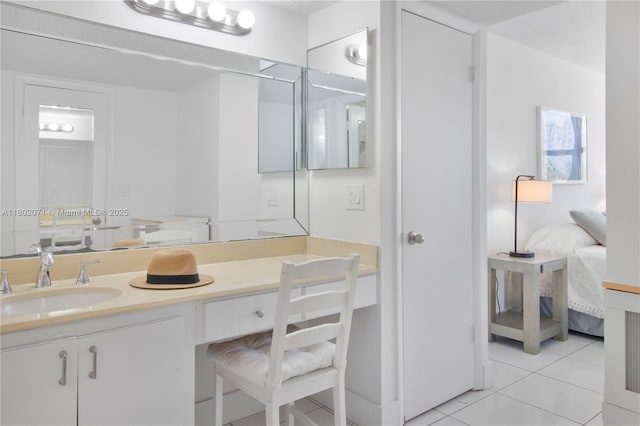 5838 Collins Ave Unit 2H, Miami Beach, FL 33140 - bathroom featuring tile patterned floors, ensuite bathroom, and vanity