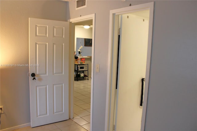 5100 SW 41st St Unit 214, Pembroke Park, FL 33023 - corridor featuring light tile patterned floors