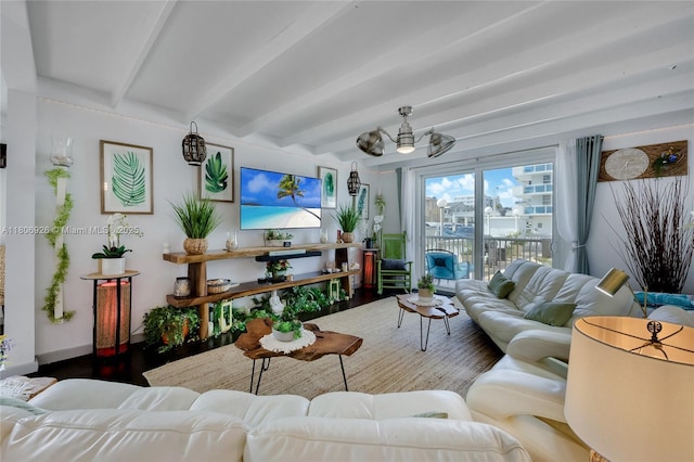 1601 S Ocean Dr Unit 106, Hollywood, FL 33019 - living room featuring beamed ceiling, wood finished floors, and baseboards