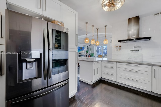 1601 S Ocean Dr Unit 106, Hollywood, FL 33019 - kitchen with stainless steel refrigerator with ice dispenser, wall chimney range hood, dark wood finished floors, and white cabinets