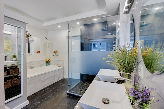 1601 S Ocean Dr Unit 106, Hollywood, FL 33019 - bathroom with a garden tub, a shower stall, vanity, a tray ceiling, and recessed lighting