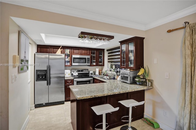 520 SW 90th Ct, Miami, FL 33174 - kitchen featuring stainless steel appliances, a sink, a peninsula, baseboards, and crown molding