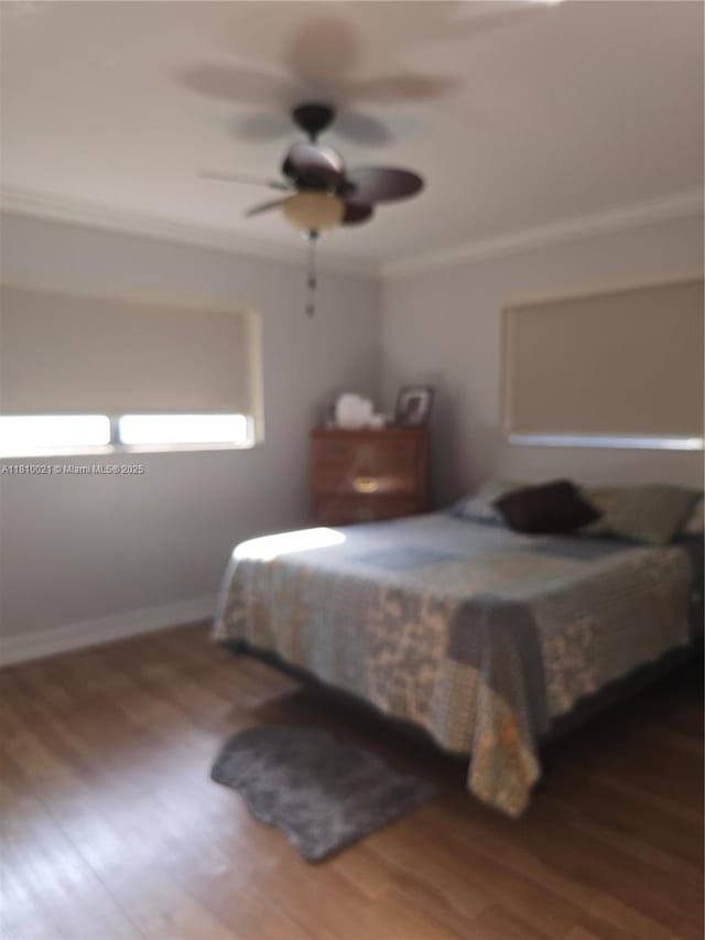 520 SW 90th Ct, Miami, FL 33174 - bedroom featuring wood finished floors, crown molding, a ceiling fan, and baseboards