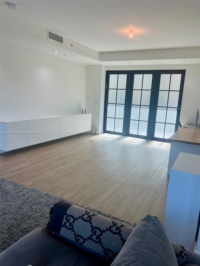 4100 SW 64th Ave Unit 201, Davie, FL 33314 - living room with wood finished floors, plenty of natural light, and baseboards