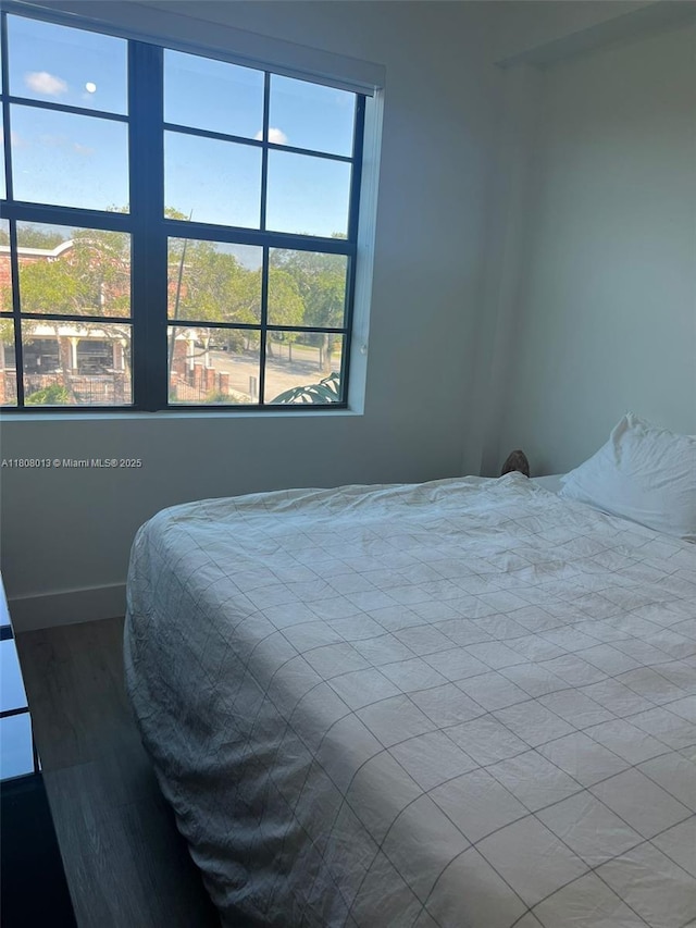4100 SW 64th Ave Unit 201, Davie, FL 33314 - bedroom with wood finished floors and baseboards