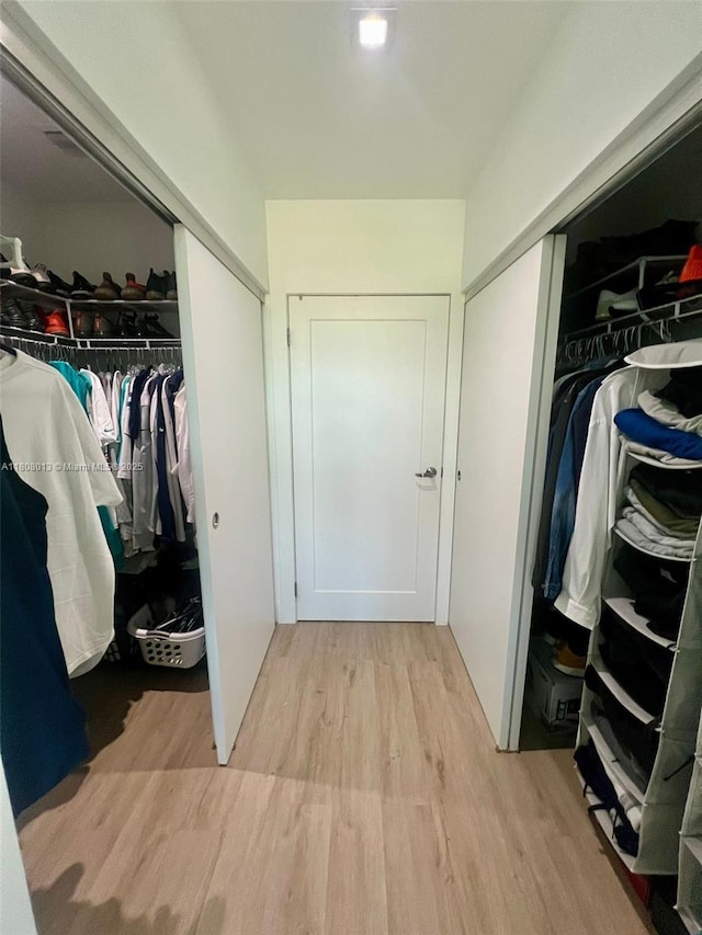 4100 SW 64th Ave Unit 201, Davie, FL 33314 - spacious closet with light wood-style flooring