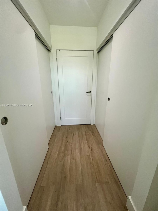 4100 SW 64th Ave Unit 201, Davie, FL 33314 - hall featuring light wood-type flooring