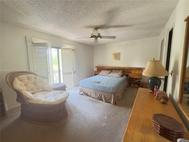12951 SW 95th Ave, Miami, FL 33176 - carpeted bedroom featuring ceiling fan, a textured ceiling, and access to exterior